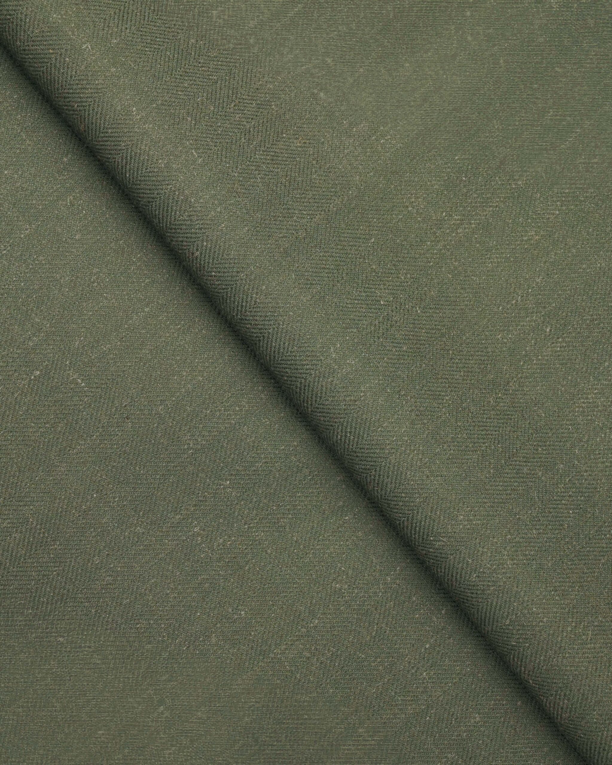 Folded-5-scaled-1.jpg Herringbone Plains - Emerald Green Fabric Swatch - Image 1